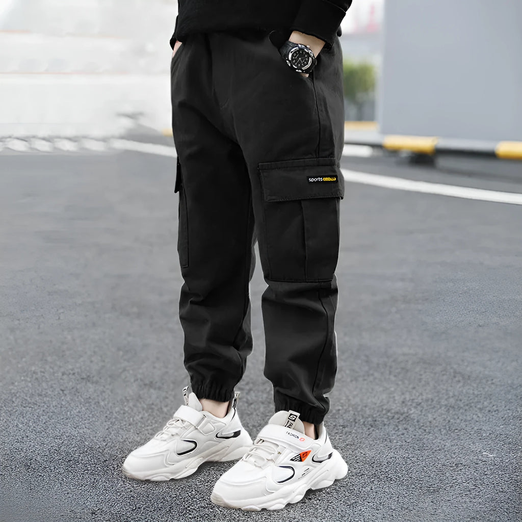 Boys' cotton casual trousers in army green, black, or khaki showing summer overalls style and non-opening crotch design