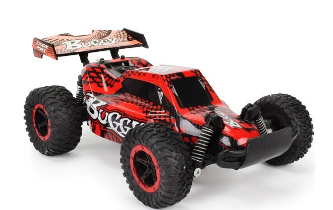 Blue 1:18 scale remote control off-road drift car with 2.4Ghz transmitter on a flat surface.
