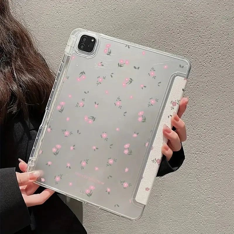 Transparent floral patterned iPad case folded into standing position showing magnetic closure and port cutouts