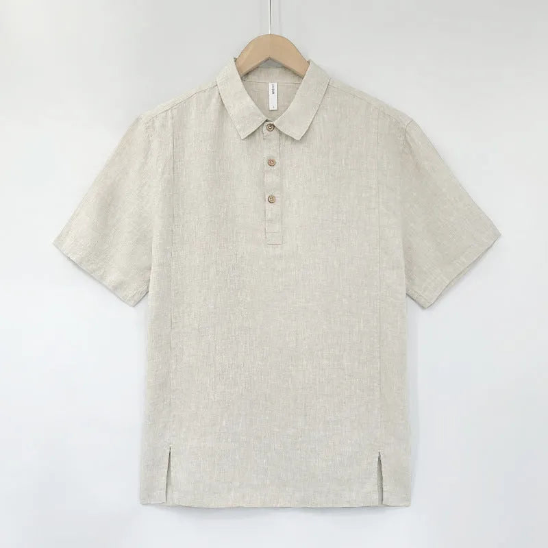 Men's short-sleeve linen top in gray green with thin lapels and a loose, relaxed fit on a hanger.