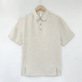 Men's short-sleeve linen top in gray green with thin lapels and a loose, relaxed fit on a hanger.