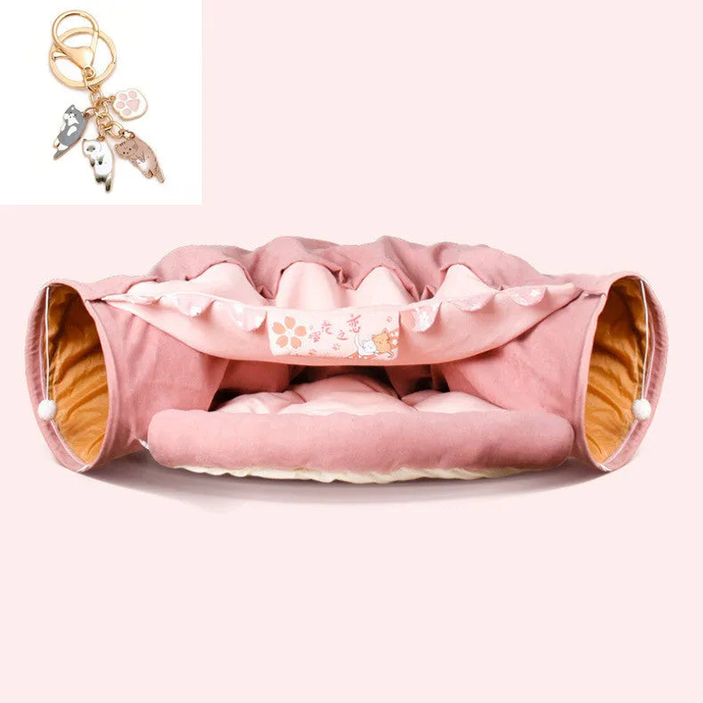 Collapsible cloth cat tunnel in Pink style, measuring 45x50x22cm, on a light background