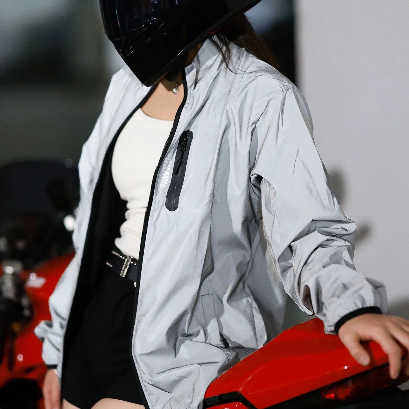 Silver waterproof polyester windproof long sleeved top showing front view