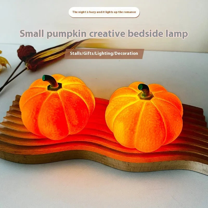 Pumpkin-shaped rechargeable decorative night light on a bedside table, 10.3 x 8 cm