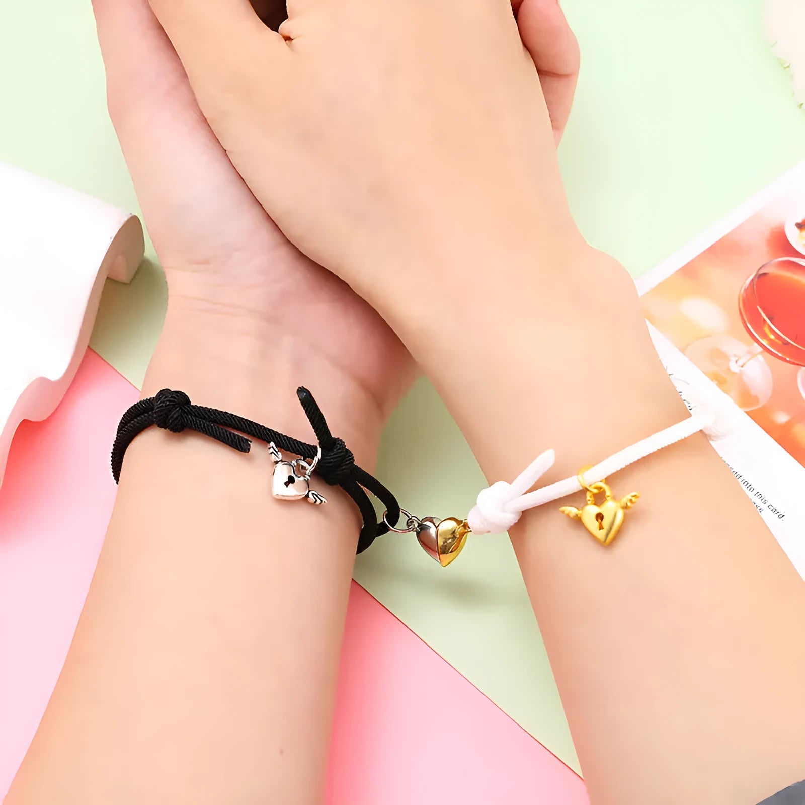 New Love Magnet couple bracelet set, heart-shaped alloy design in black and white, matching pair