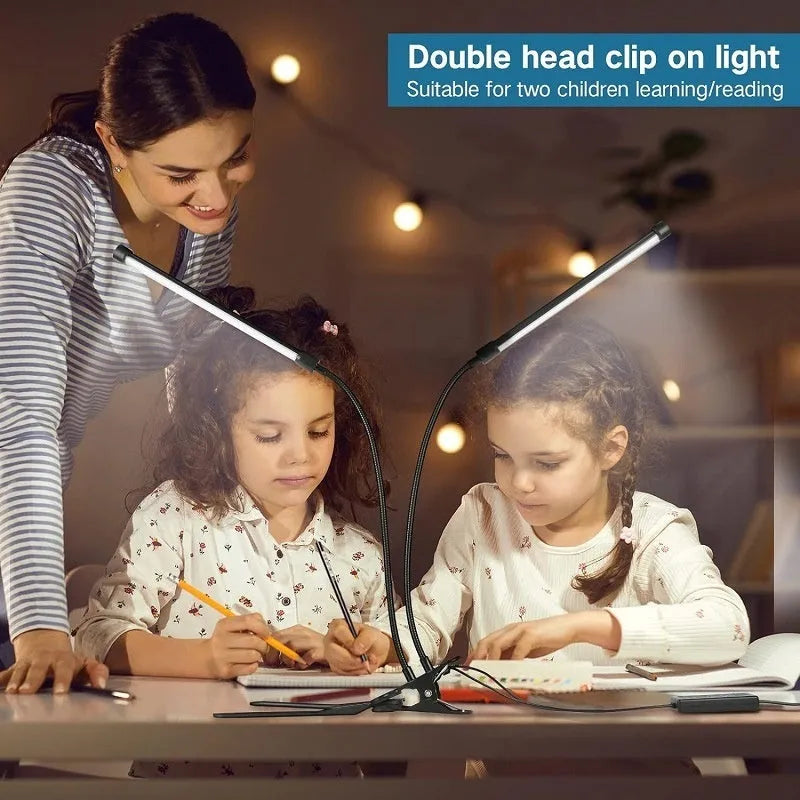 Black and white USB-powered LED desk lamp with a 26 cm length on a desk.
