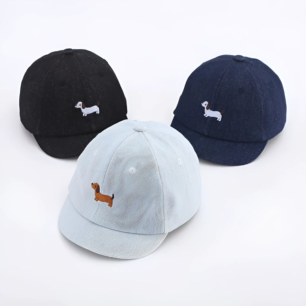 Baby denim baseball cap with puppy patch in light blue, dark blue, and black colour options.