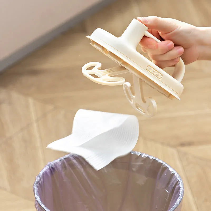 Magic Brush cleaning tool with disposable rag refills for multi-surface household cleaning
