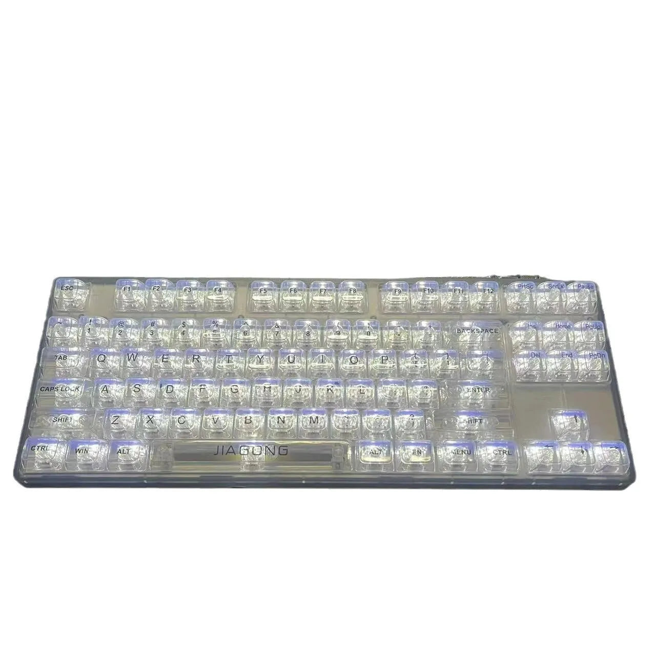 Transparent plastic 132-key mechanical keyboard key cap set displayed on white background