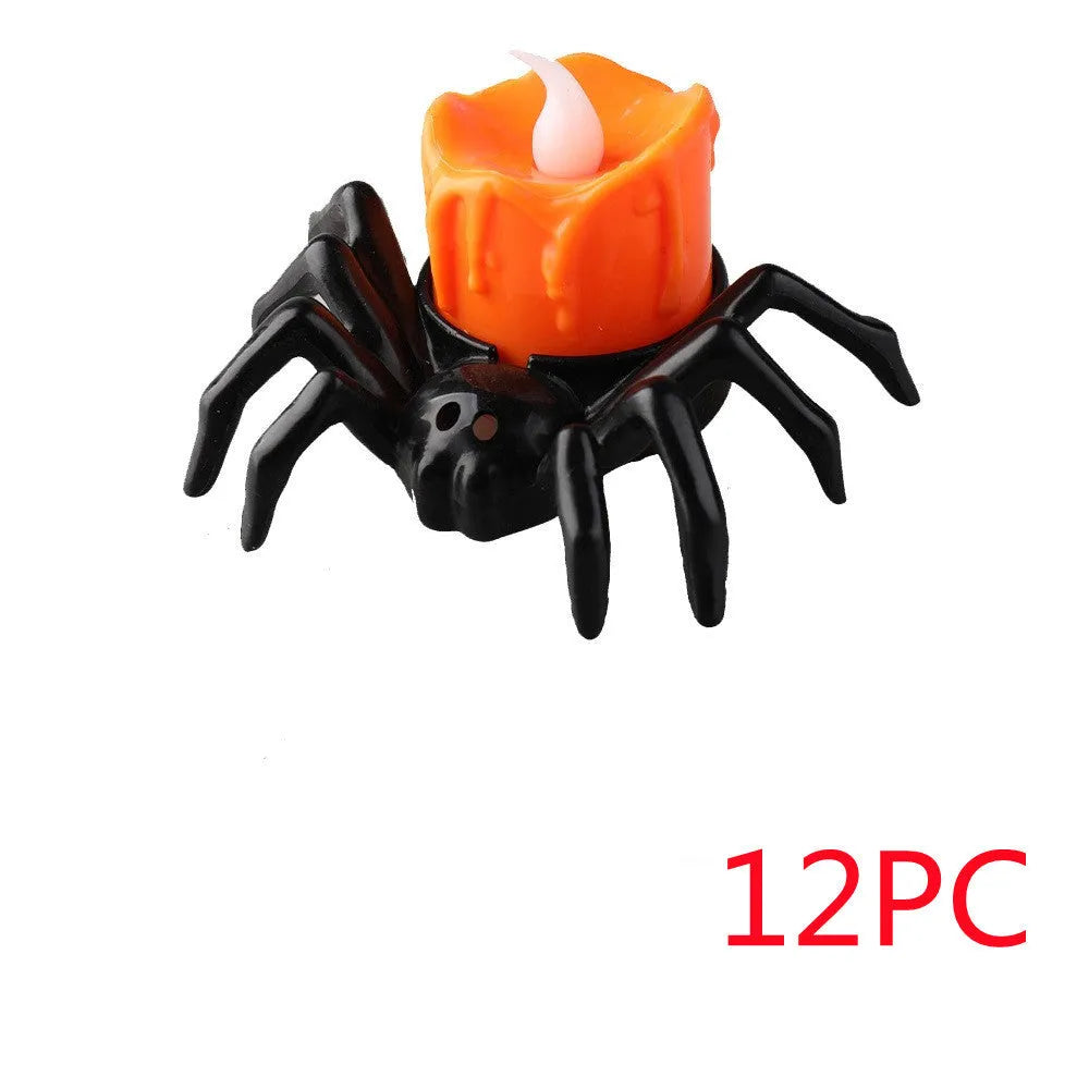 Plastic Halloween spider candlestick ornament with battery-operated candle light.