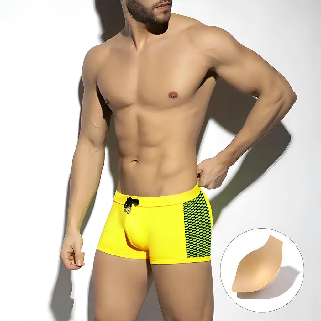 Men's polka dot print quick-dry swimming boxers in yellow, black, and dark blue.