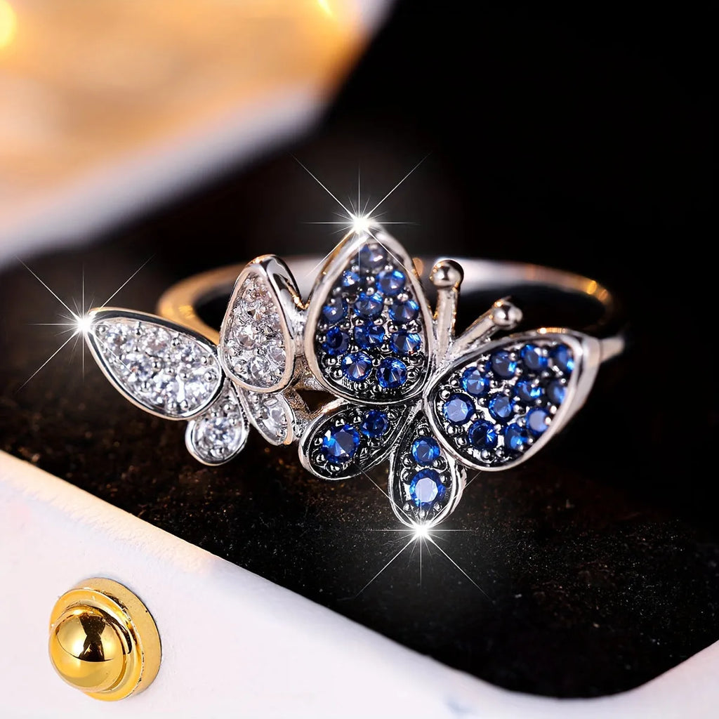 Blue and white butterfly ring for women in copper with electroplated finish, sizes 6-10