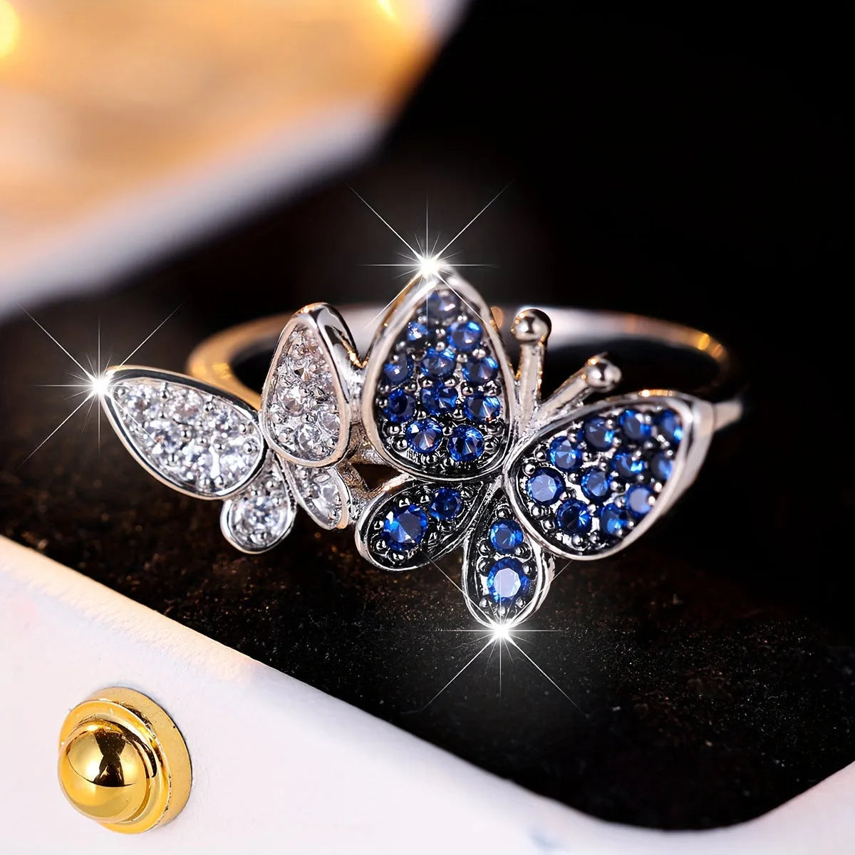 Blue and white butterfly ring for women in copper with electroplated finish, sizes 6-10