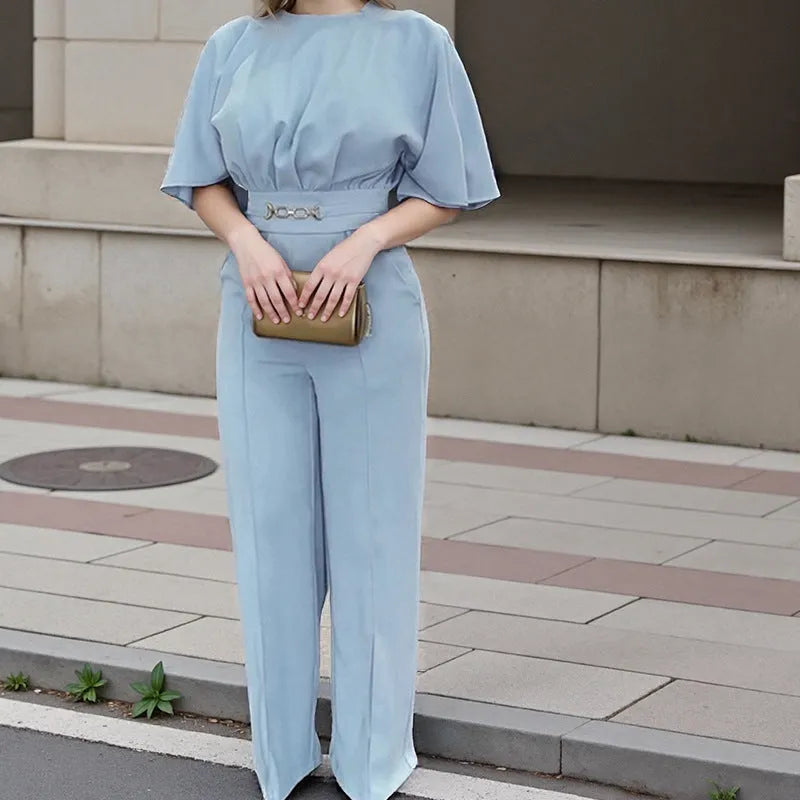 Blue men's polyester suit set with long-sleeved jacket and trousers on a hanger.