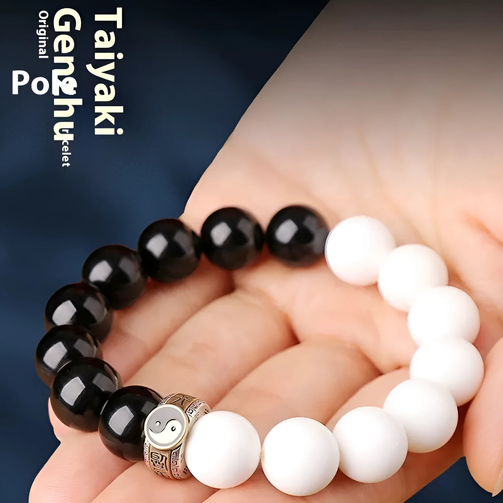 Black and white Tai Chi bracelet with obsidian beads and mantra charm