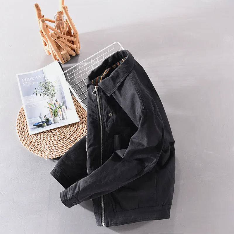 Men's black striped contrast jacket with zip front, cotton filling, side seam slip pockets, and straight hem.