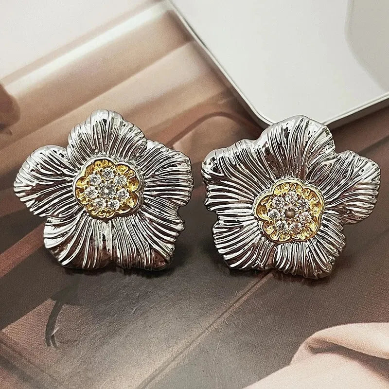 Pair of copper gardenia stud earrings with textured petals in a two-tone electroplated finish