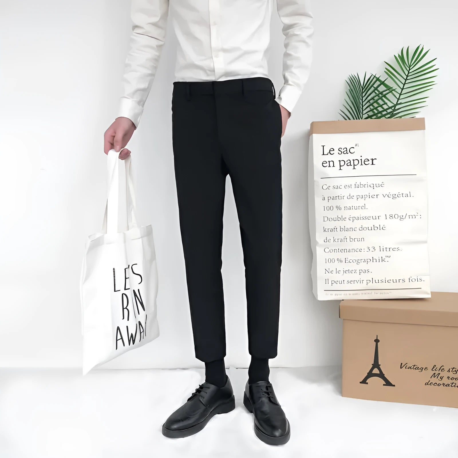 Men's straight-leg casual pants in black cotton fabric with drawstring waist closure