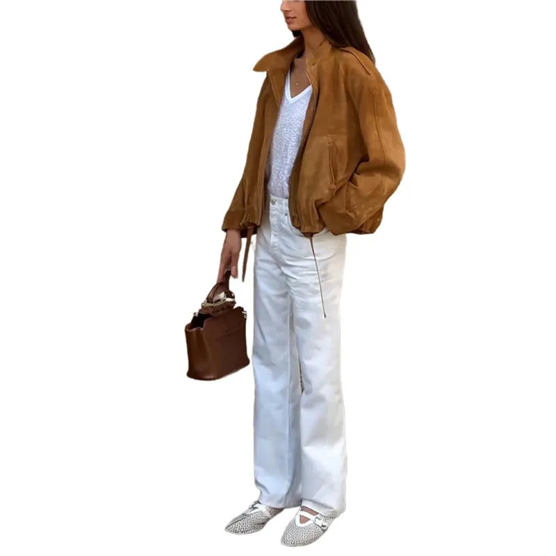 Man wearing a solid colour retro loose-fit polyester jacket with long sleeves.