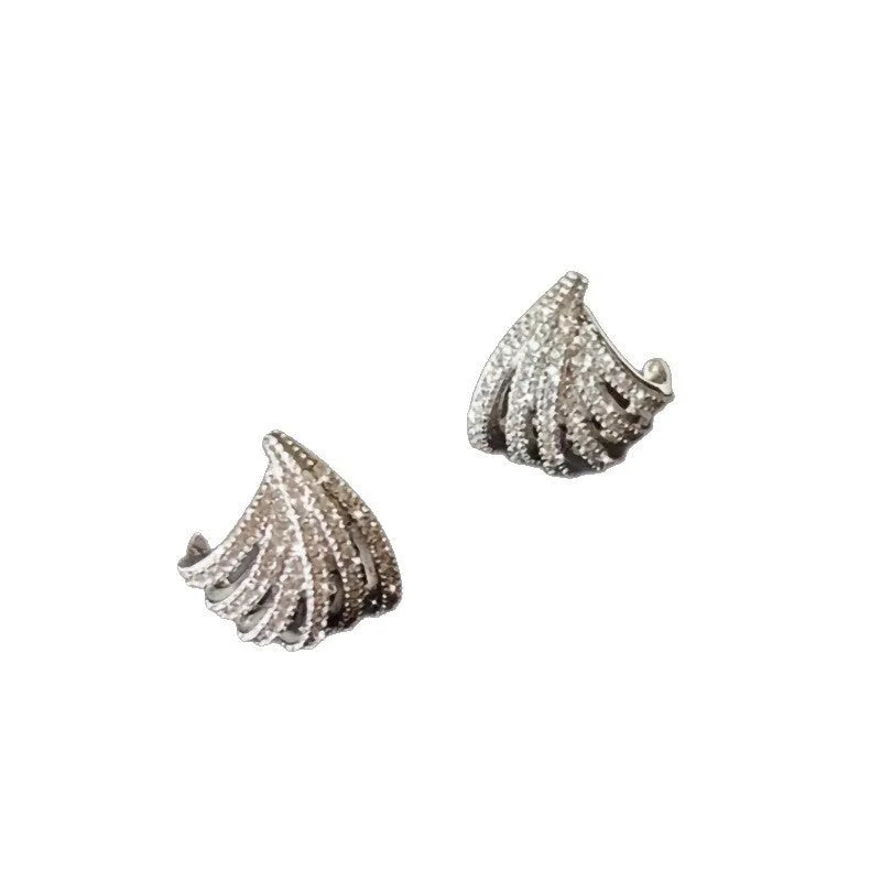 Geometric platinum-coloured zircon earrings for women on a white background.