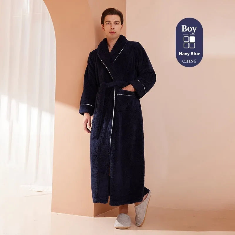 A man and woman wearing matching heavyweight navy blue flannel bathrobes, a couple's winter nightgown set.