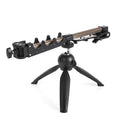 Aluminium ice fishing rod holder bracket with a tripod base on ice.