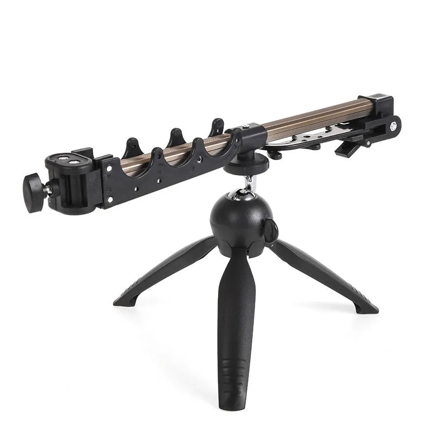 Aluminium ice fishing rod holder bracket with a tripod base on ice.
