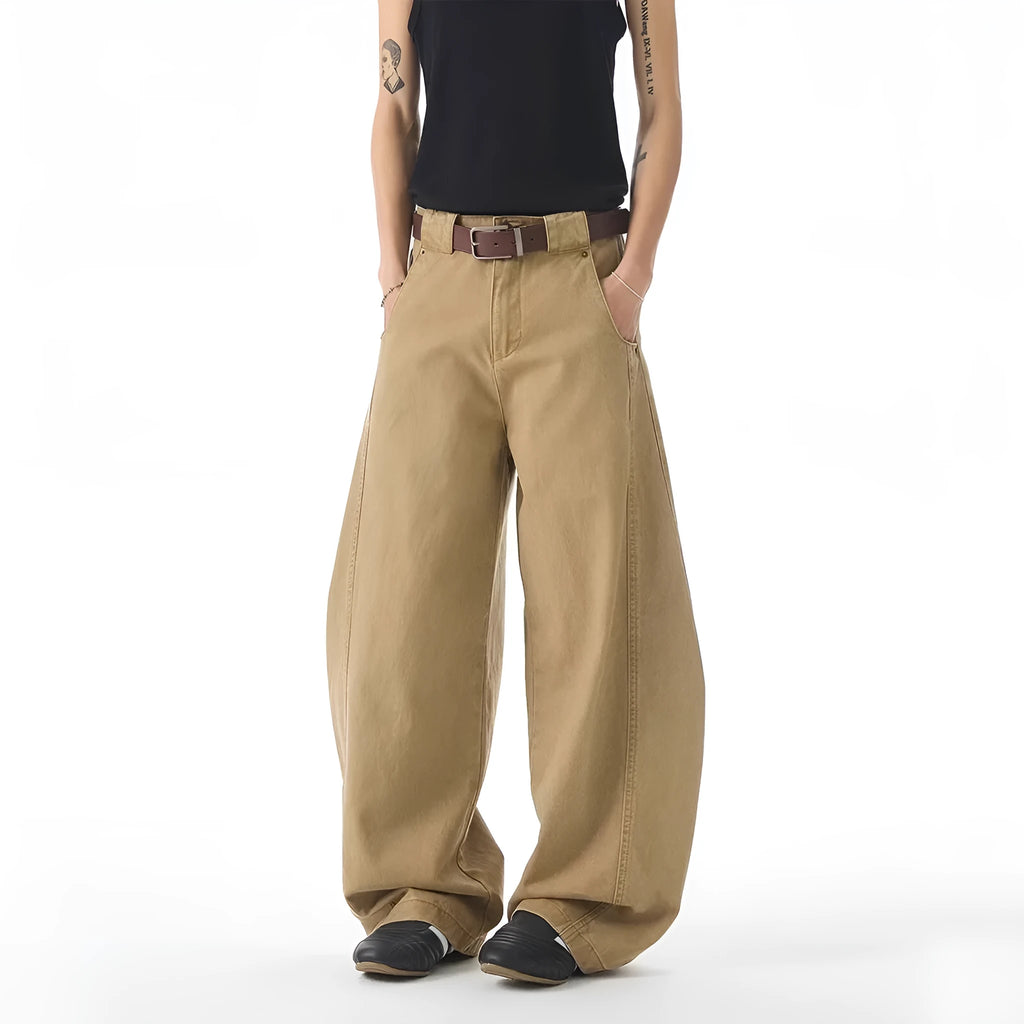Men's brown loose-fit straight-leg casual jeans with a button fly on a mid waist.
