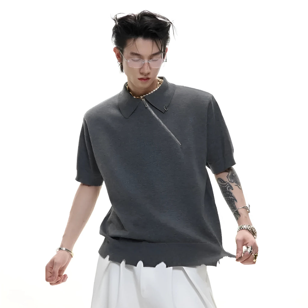 Man wearing a slim-fit grey knitted polo shirt with a diagonal oblique zipper and lapel collar.