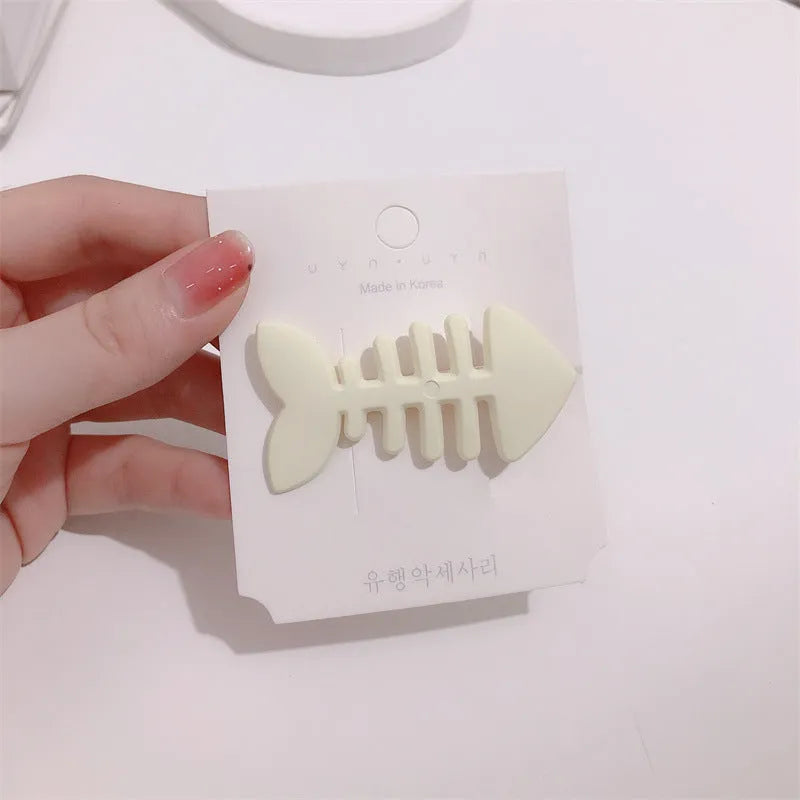 Minimalist fishbone pattern hair barrette with duckbill clip in a candy colour.