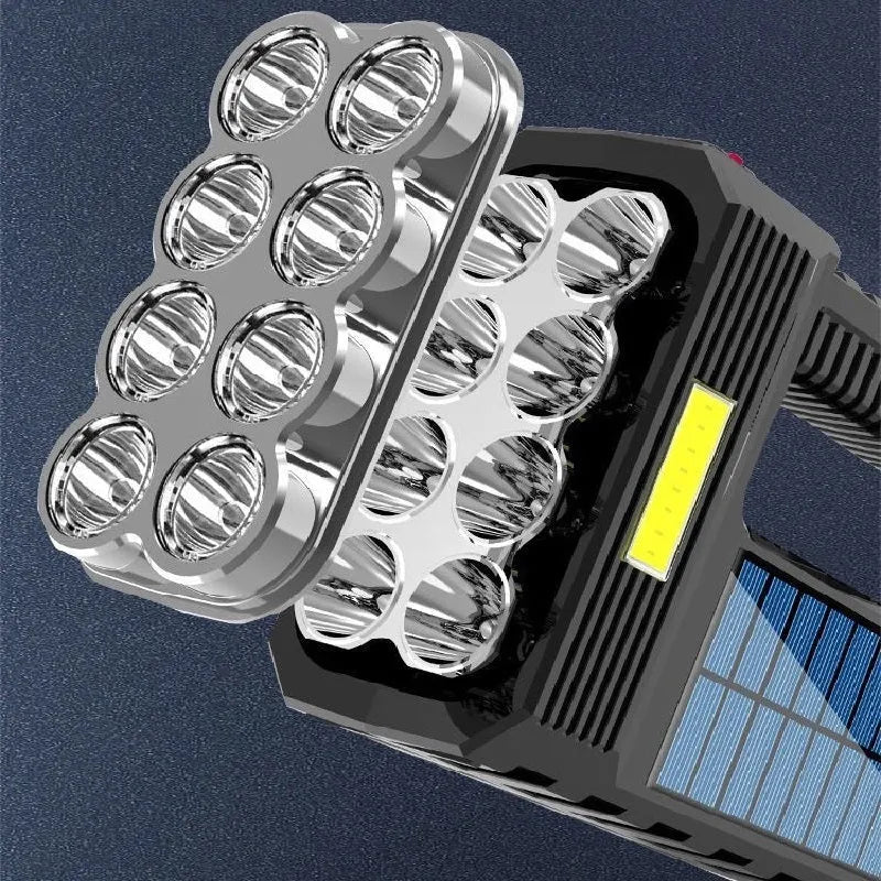Solar rechargeable USB LED flashlight with 8 heads and side light COB, aluminium alloy body, 225g, four brightness modes