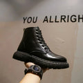 Men's black platform Doc Martens boots with side zipper and frosted cowhide upper, showing 8-hole high-top design.