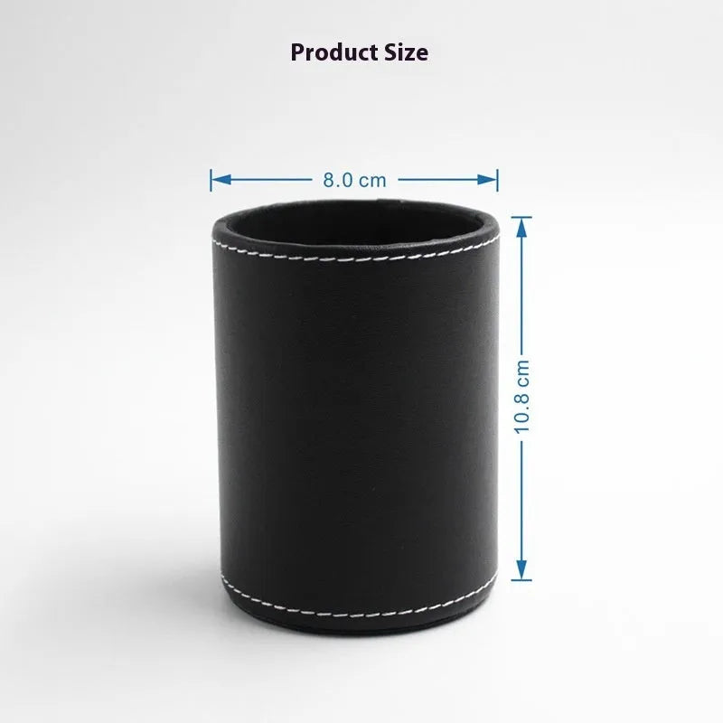 Small round black leather pen container for desk organisation.