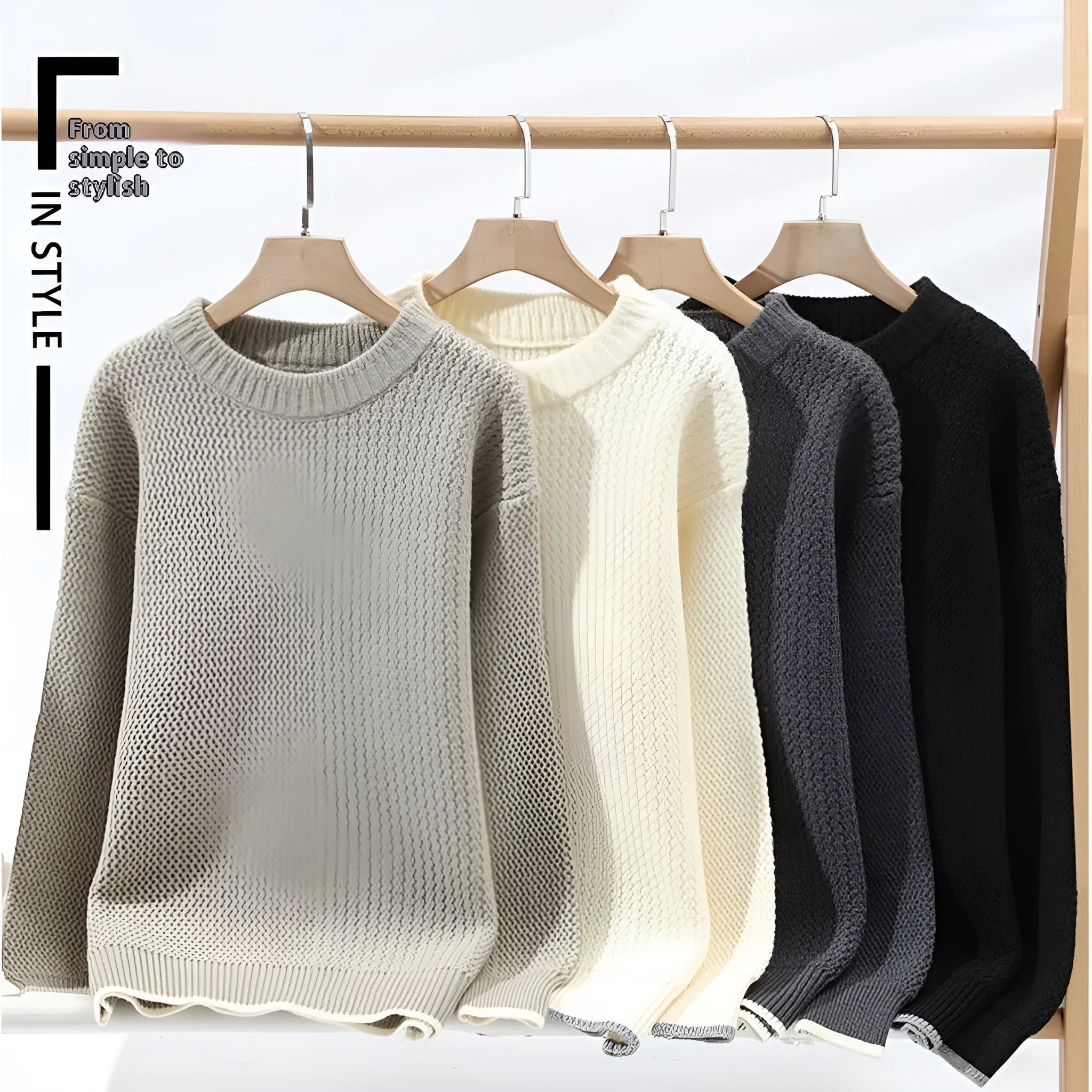 Man wearing a grey loose-fit round neck knitwear pullover sweater for casual autumn wear.