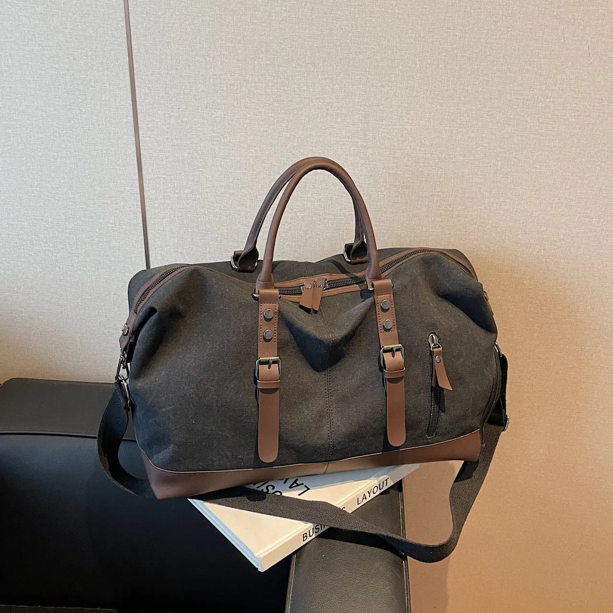 Canvas travel shoulder bag in solid green colour for leisure use