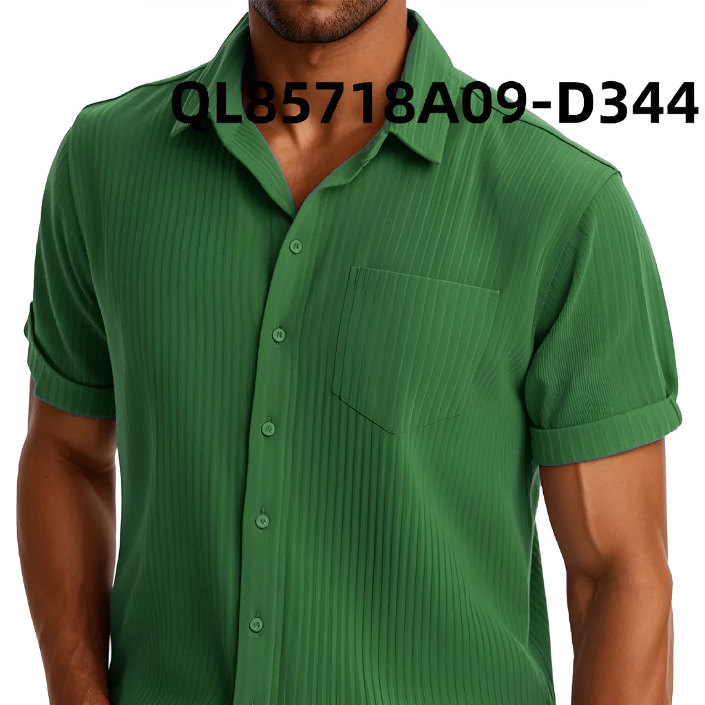 Man wearing a loose-fitting black and white printed short sleeve lapel shirt made of polyester.
