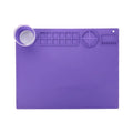 Light blue silicone painting mat measuring 50x40cm with two raised mixing bowls on its surface.