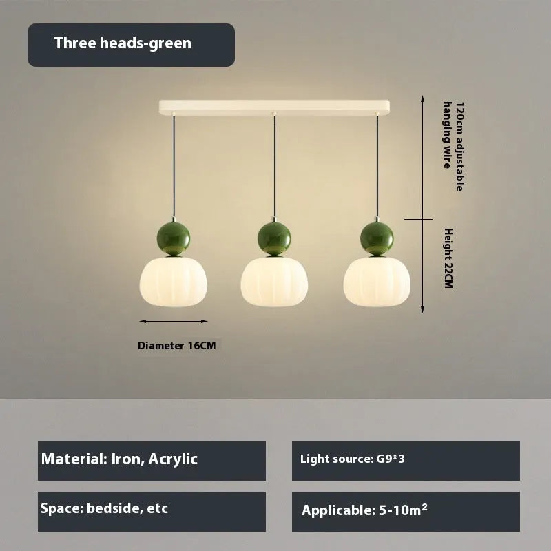 Creative alloy pumpkin chandelier light fixture for ceiling mounting in cream, red, green, chrome, or walnut finish.