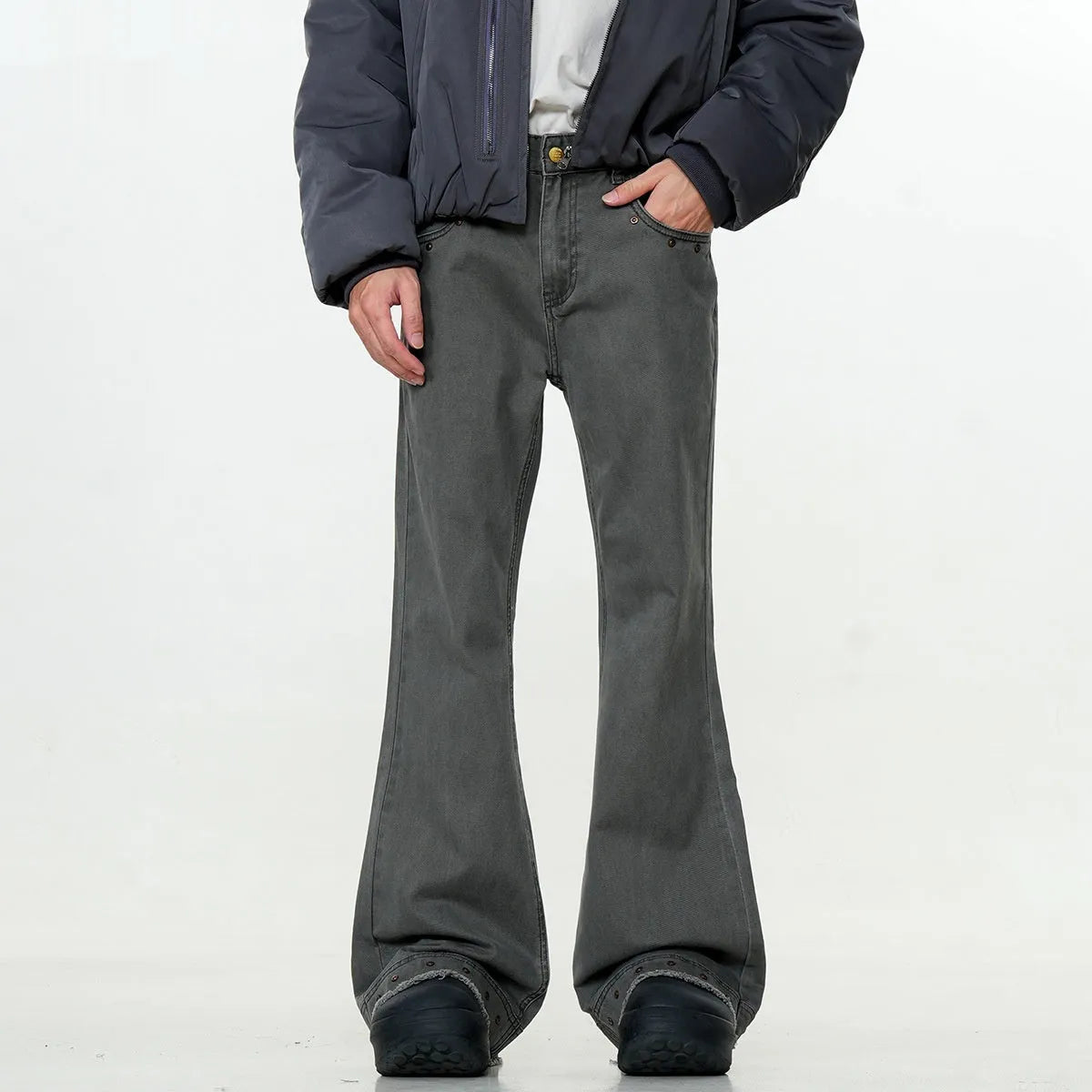 Black and grey green cotton retro skinny jeans with a straight leg and horn opening on a mid waist.