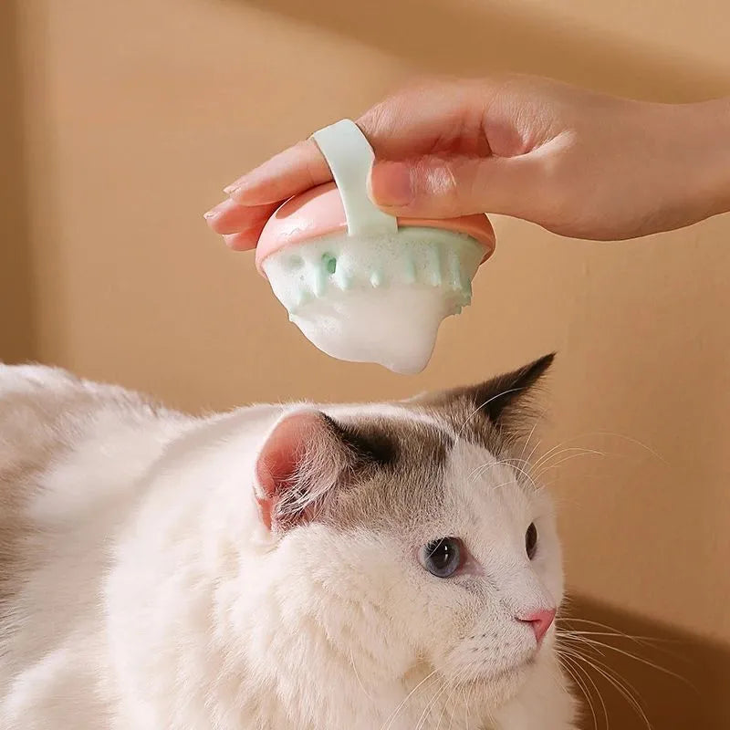 Silicone pet bathing brush with massage nubs for cats and dogs in blue, pink, white, or yellow options
