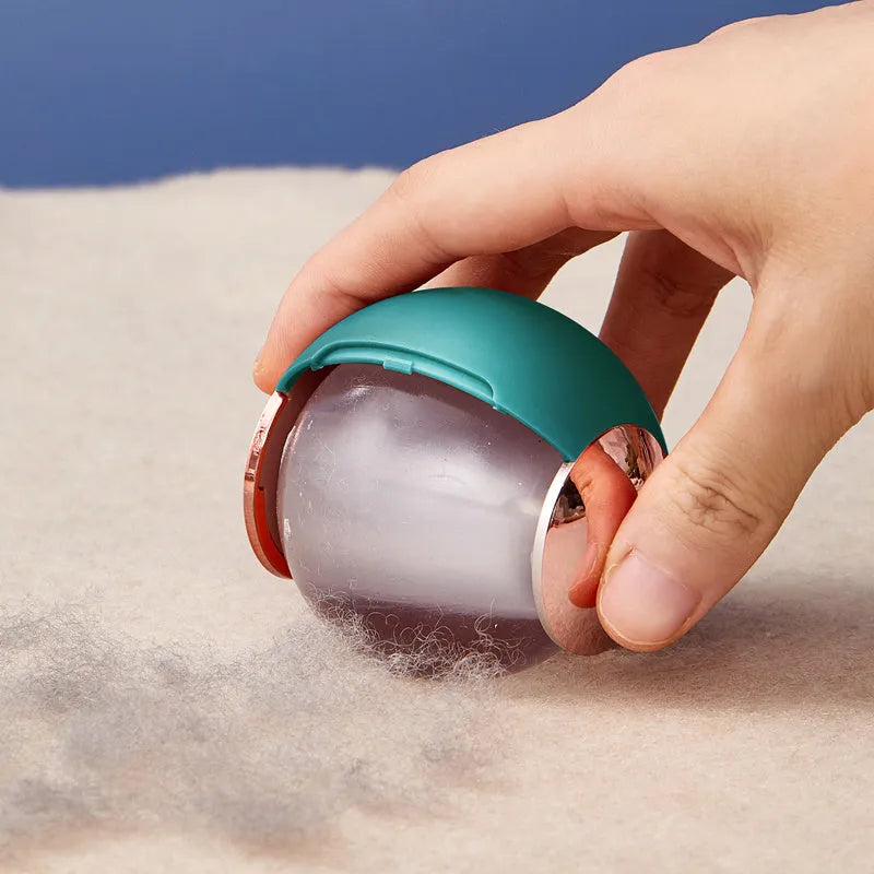 Green gold reusable gel lint roller ball for washing pet hair and lint from fabrics.