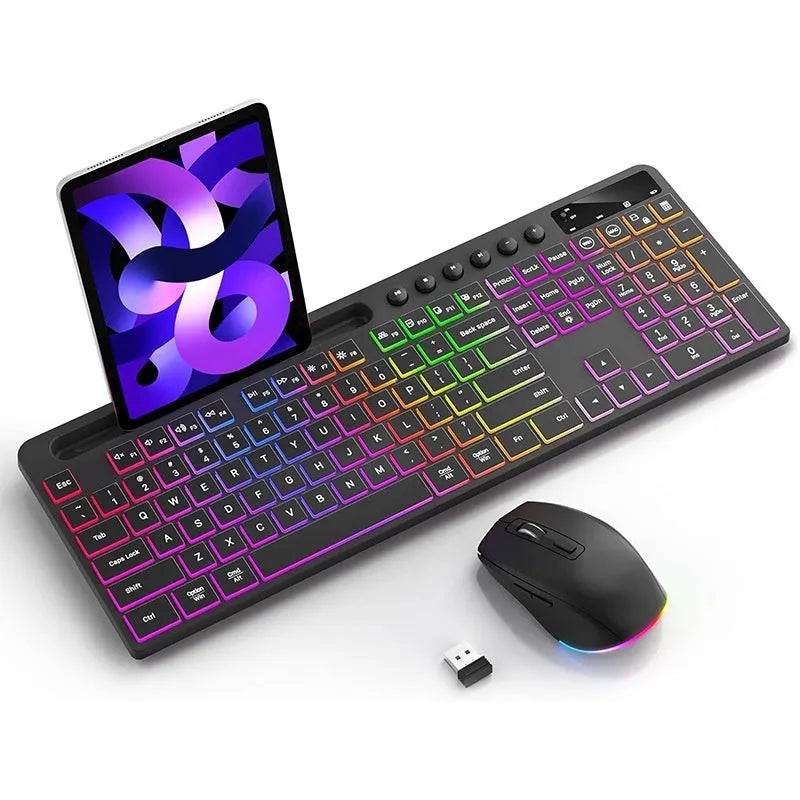 Black wireless keyboard and mouse set on a desk, showing luminous keys and integrated card slot.