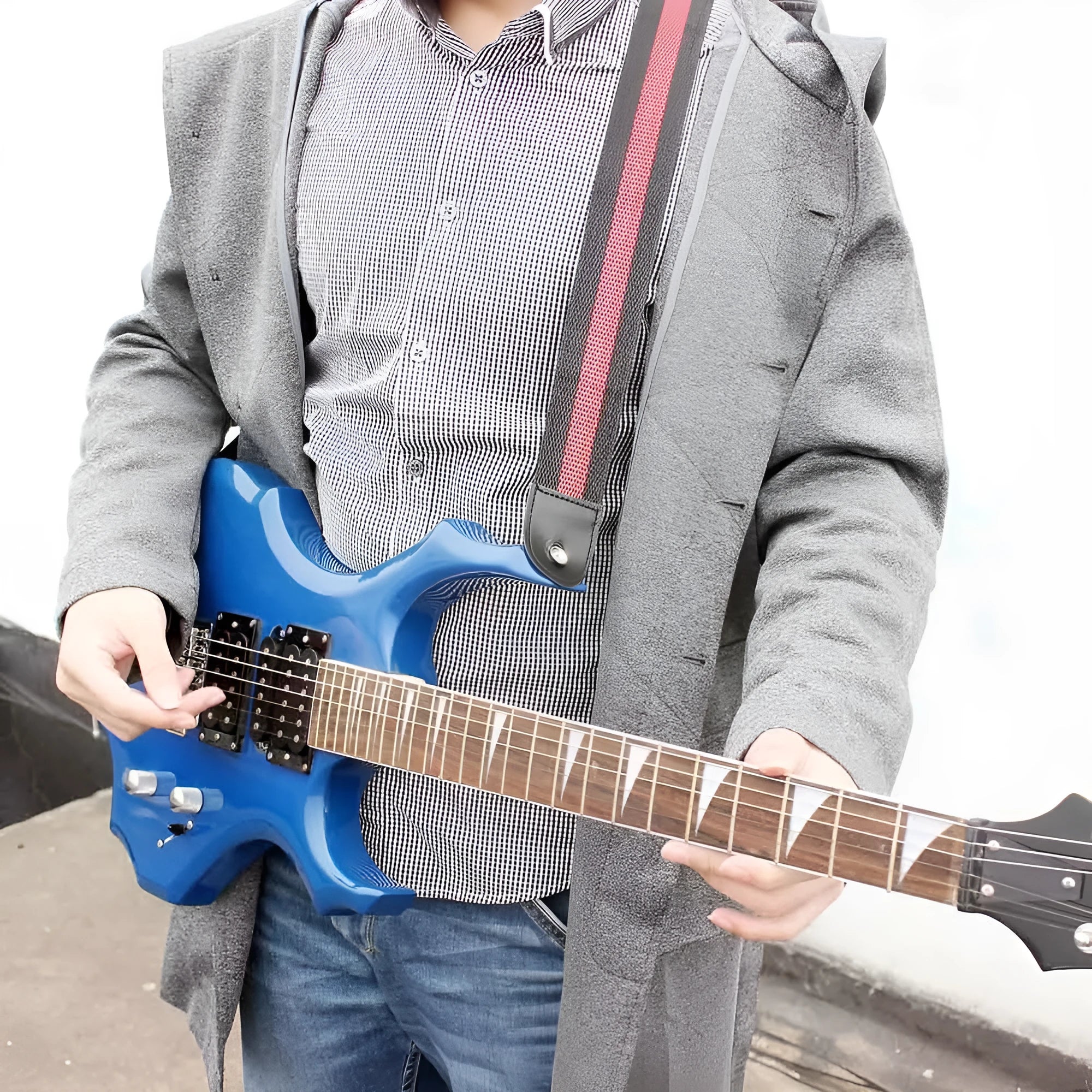 Universal woven guitar and ukulele strap in Army Green with classic stripe pattern, showing strap pins.