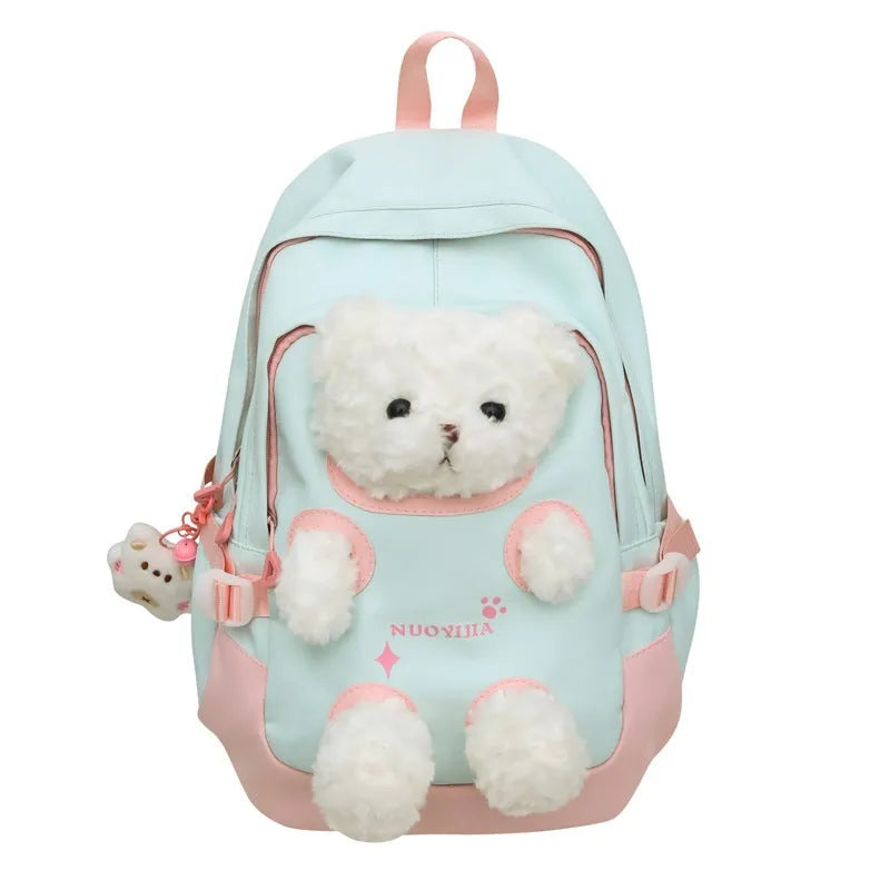 Nylon school backpack in macaron colours with curved shoulder straps and literary style design.