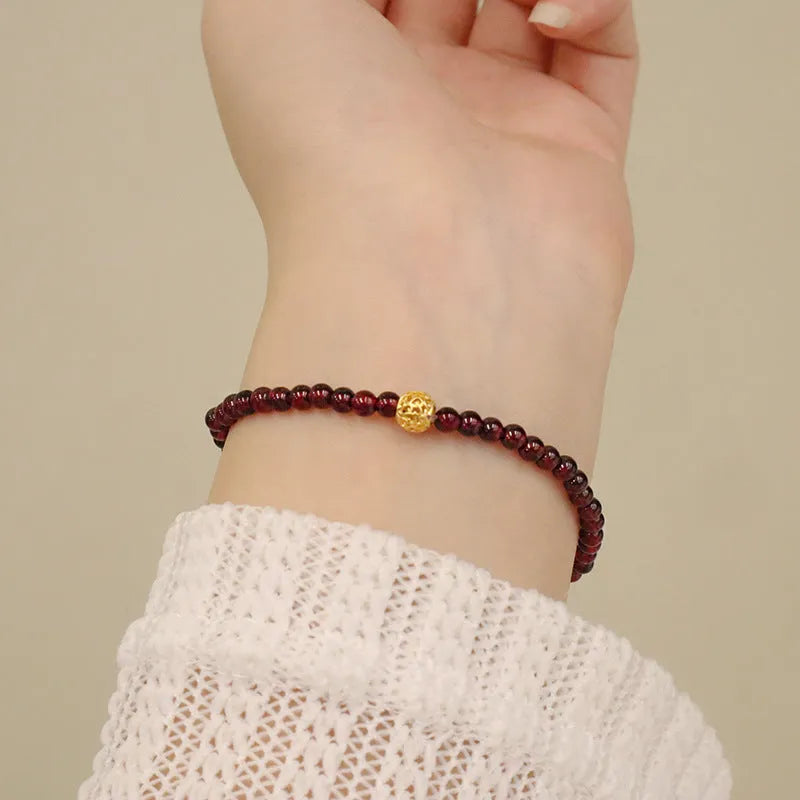Chinese-style gourd bracelet with imitation garnet beads and Fu character symbols on U-shaped electroplated setting