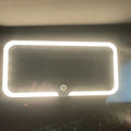 White ABS car sun visor mirror with LED lights and aluminium lens for make-up application.