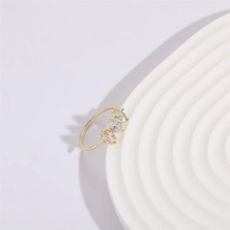 Geometric triangle birthstone ring with horse eye tricolor zircon stone in 14k gold plating