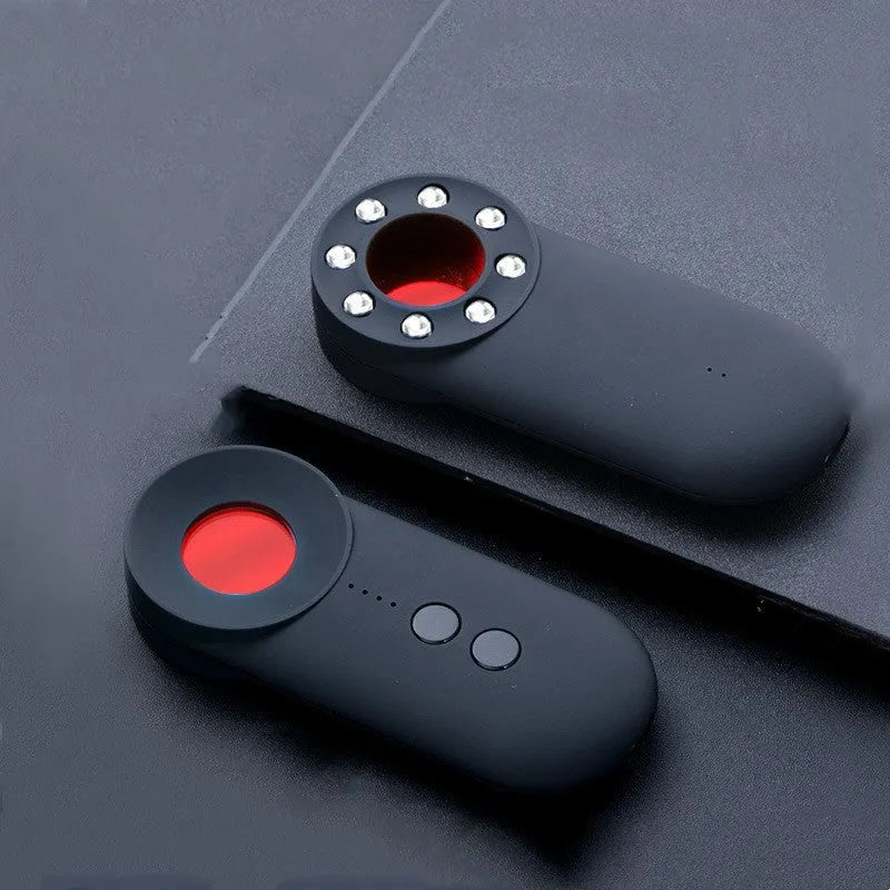 Black ABS handheld GPS and camera lens detector with a USB charging port.