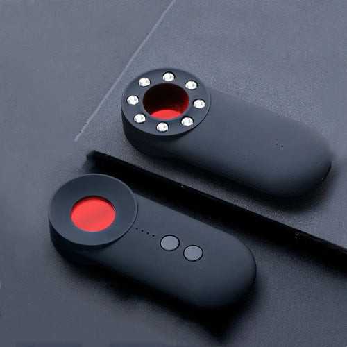 Black ABS handheld GPS and camera lens detector with a USB charging port.