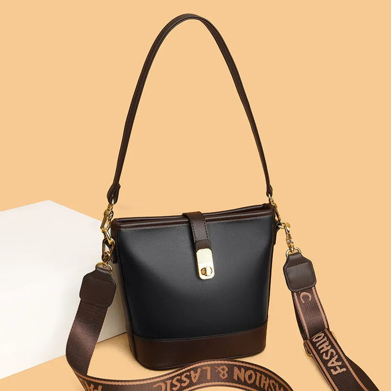 Korean style black PU bucket messenger bag with dual shoulder straps and internal organiser compartments